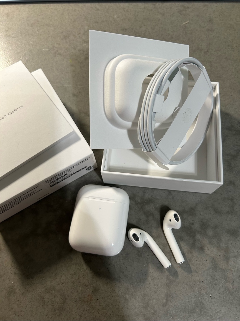 Apple White Wireless Earbuds with Charging Case and Cable